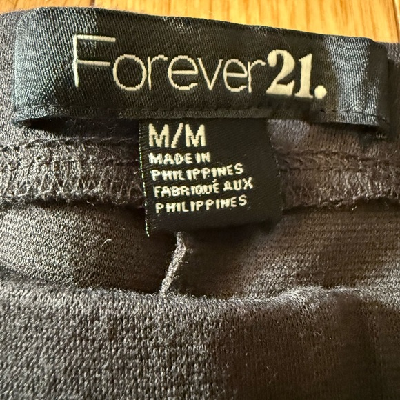 Forever 21 women’s medium gray fitted pants with waistband and two zippers. - Picture 4 of 5